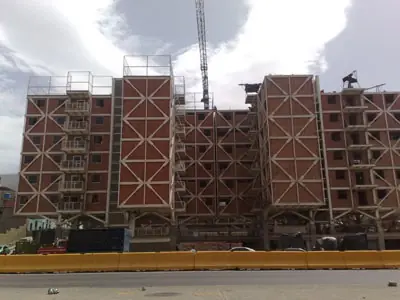 Photograph of a social residential complex with limited spaces